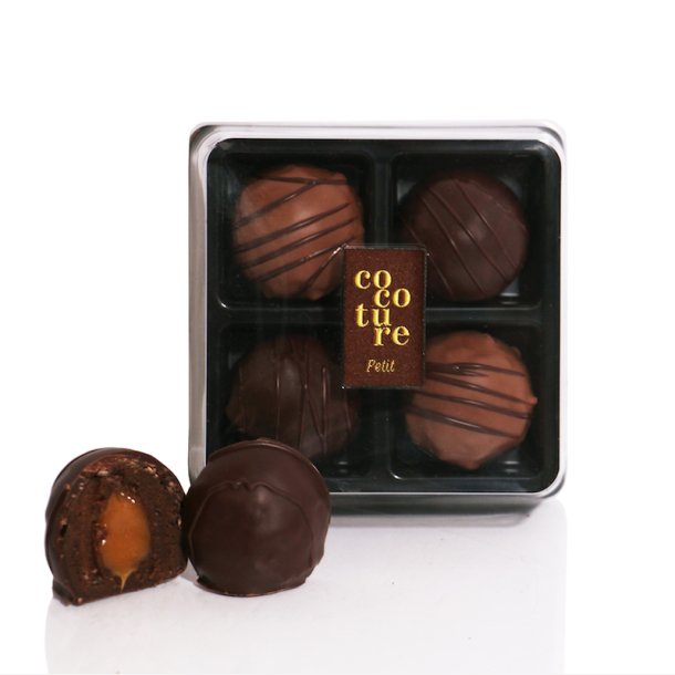 4 luksus trffel-romkugler i sort ske